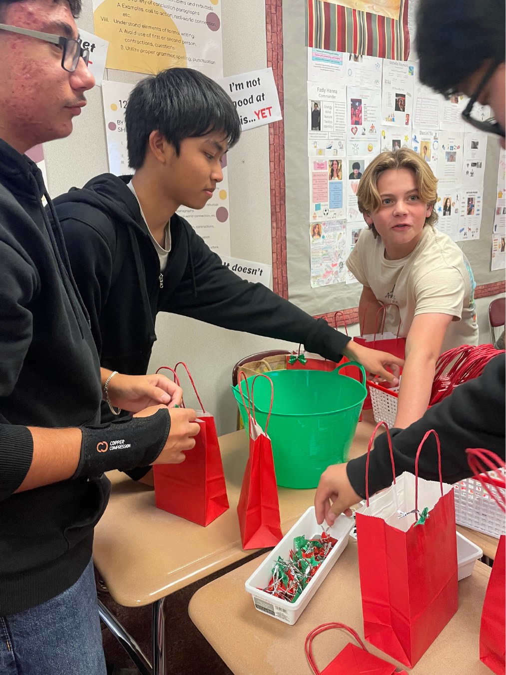 Students preparing care kits together