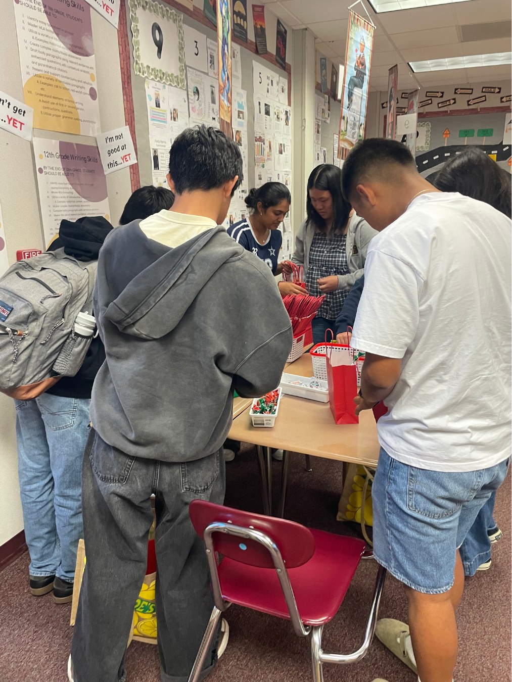 Students packing bags and preparing supplies
